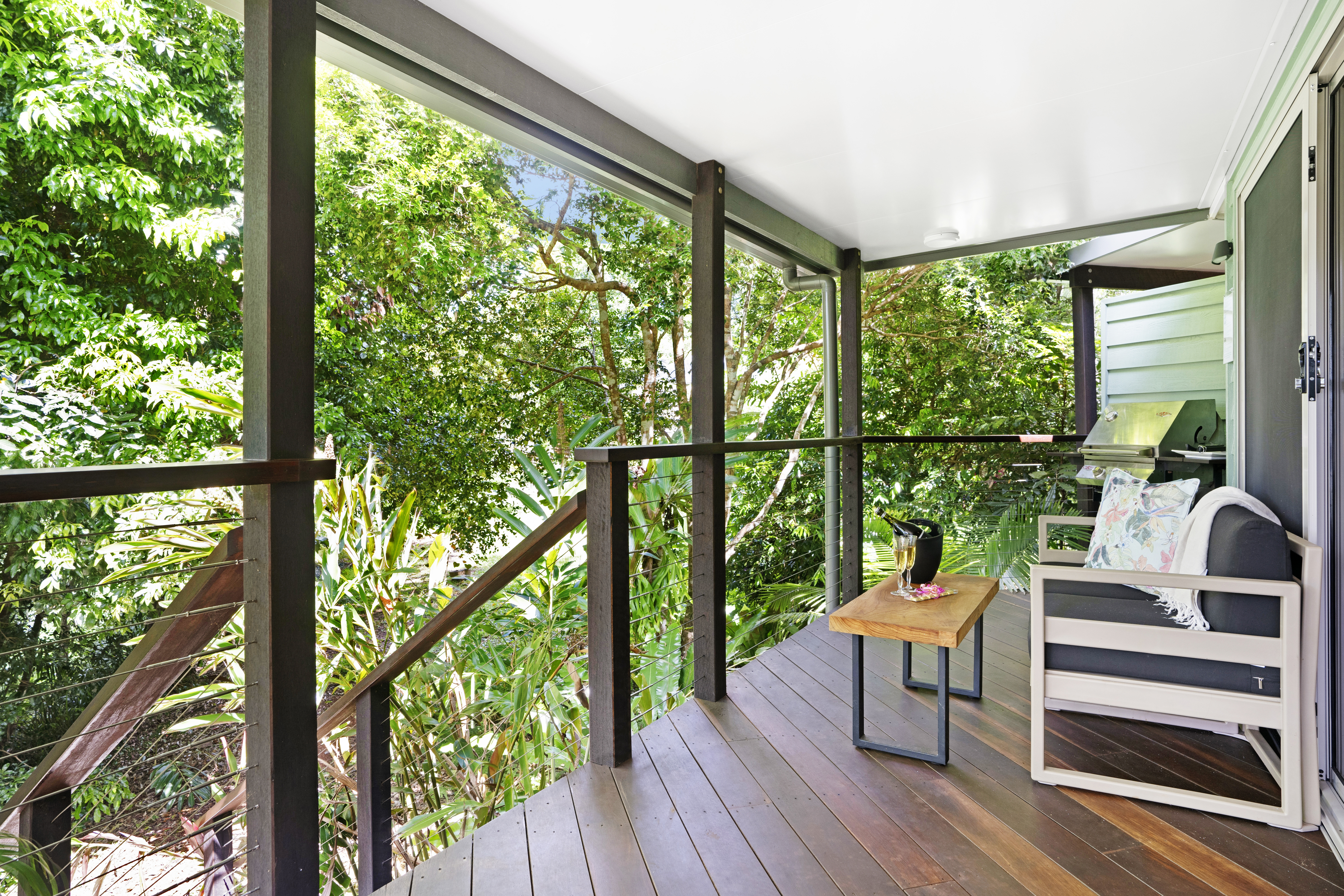 Lovestone Cottages_Maple Cottage Balcony with rainforest and lake views_005.jpg